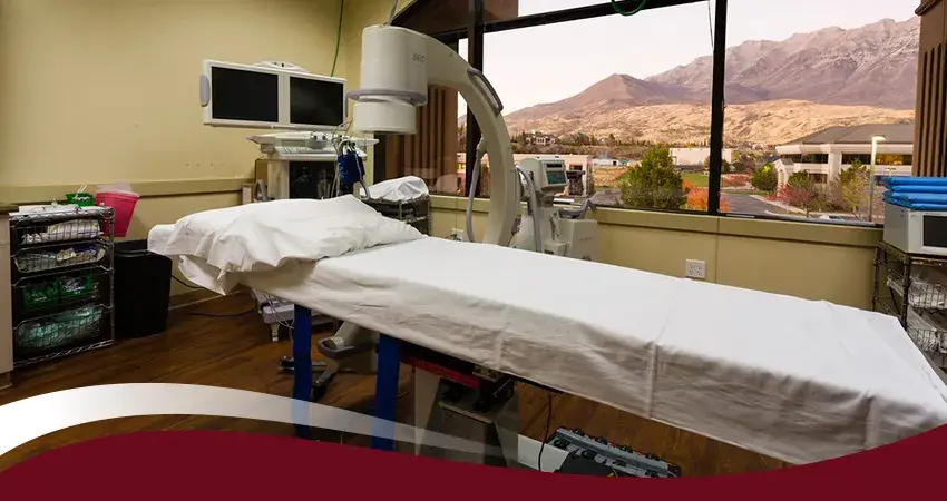 Medical procedure room with OEC imaging equipment and mountain view